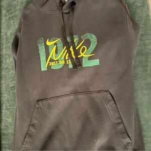 Nike Black Hoodie with Green and Yellow Logo